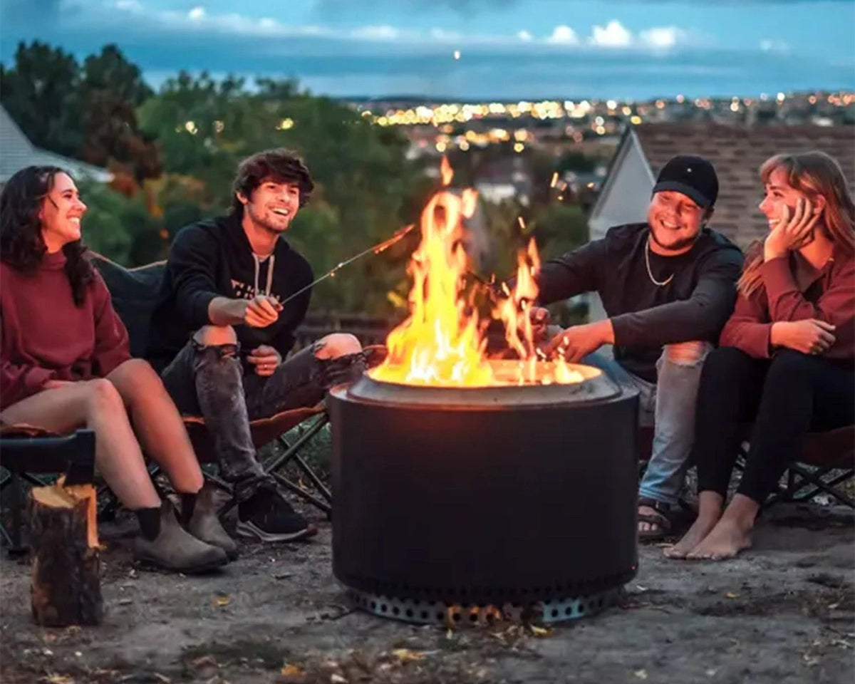 Solo Stove Yukon Black firepit in cozy outdoor setting