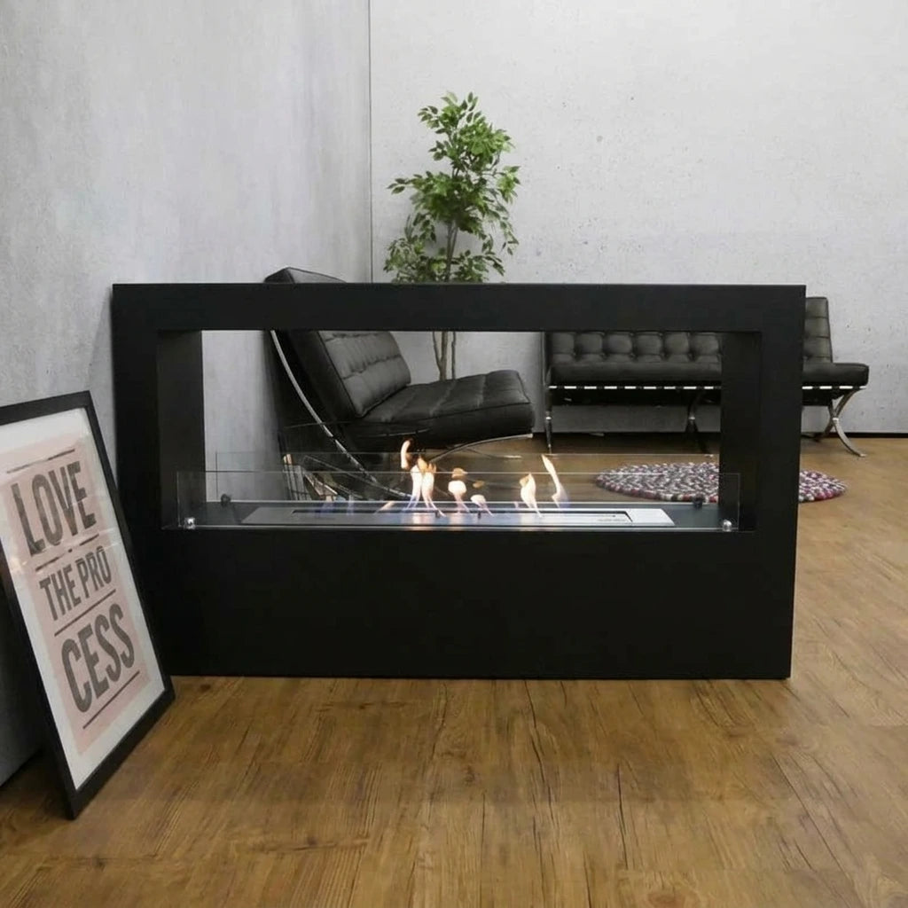 Lansing XL black two-sided freestanding bio fireplace as a room divider in a modern living space with concrete wall and black chairs