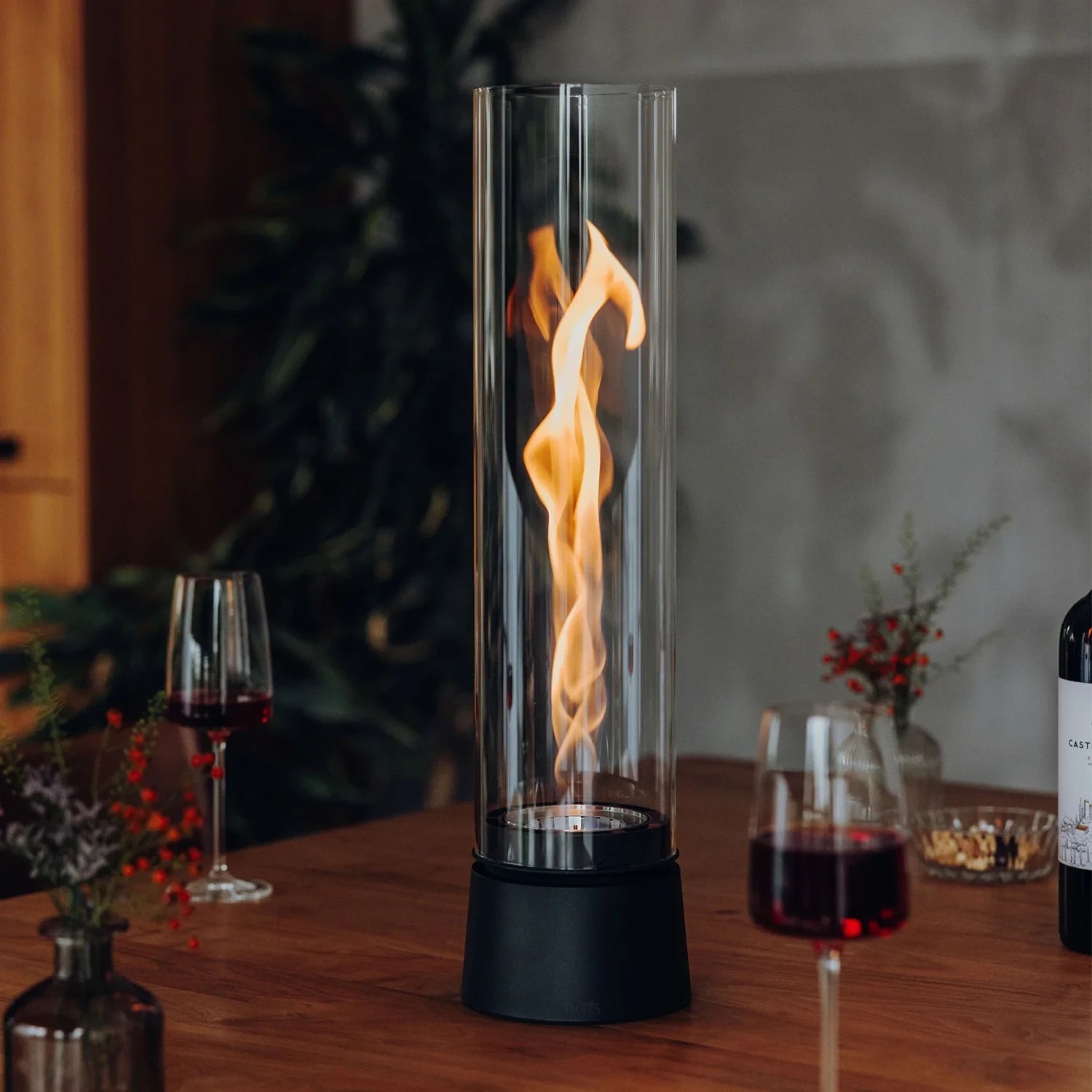 Höfats SPIN Air 1200 - Matt black table bioethanol fireplace with tall cylindrical glass.