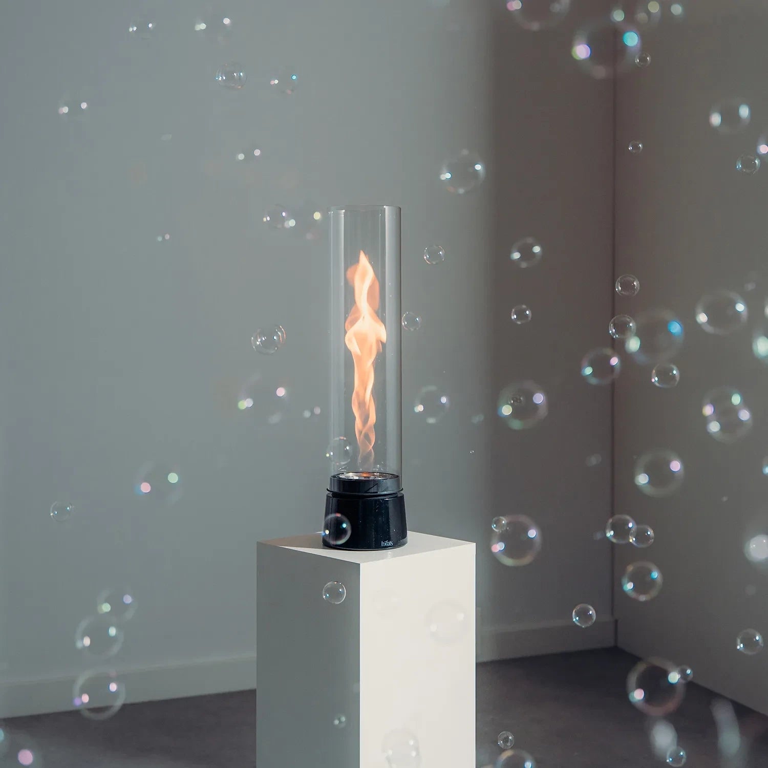 Höfats SPIN Air 900 black tabletop bioethanol fireplace with tall cylindrical glass