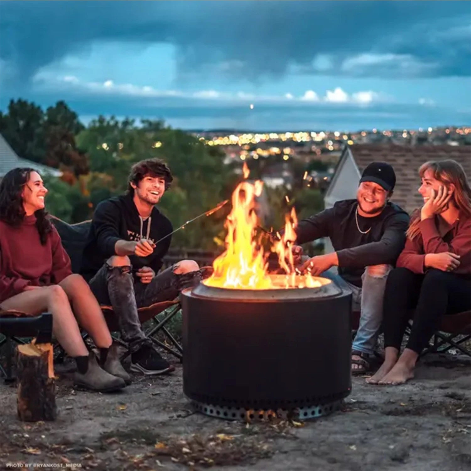 Solo Stove Yukon Black firepit in cozy outdoor setting