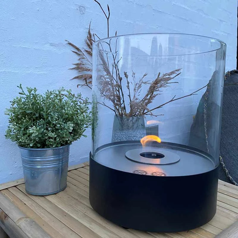 Southwark - svart rund etanolkamin med glas till bord